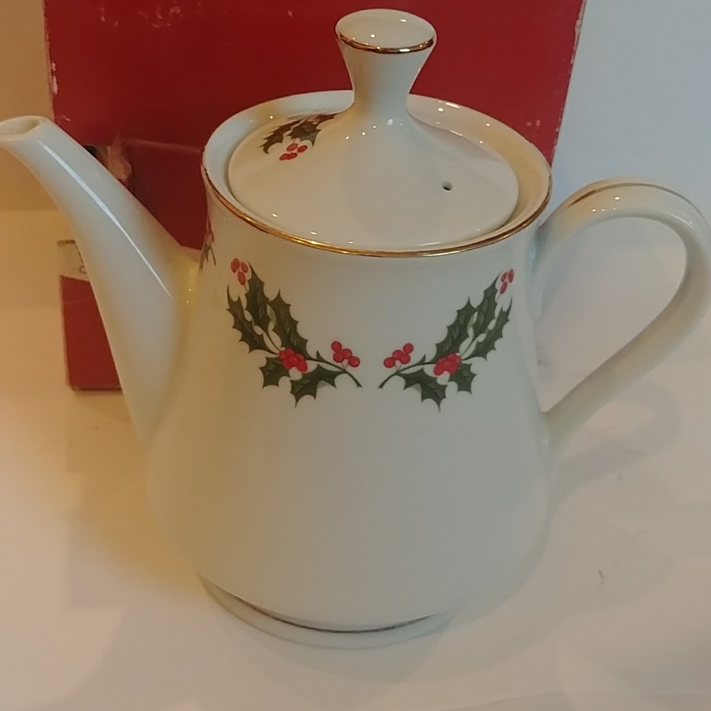 Hand decorated porcelain tea or coffee pot